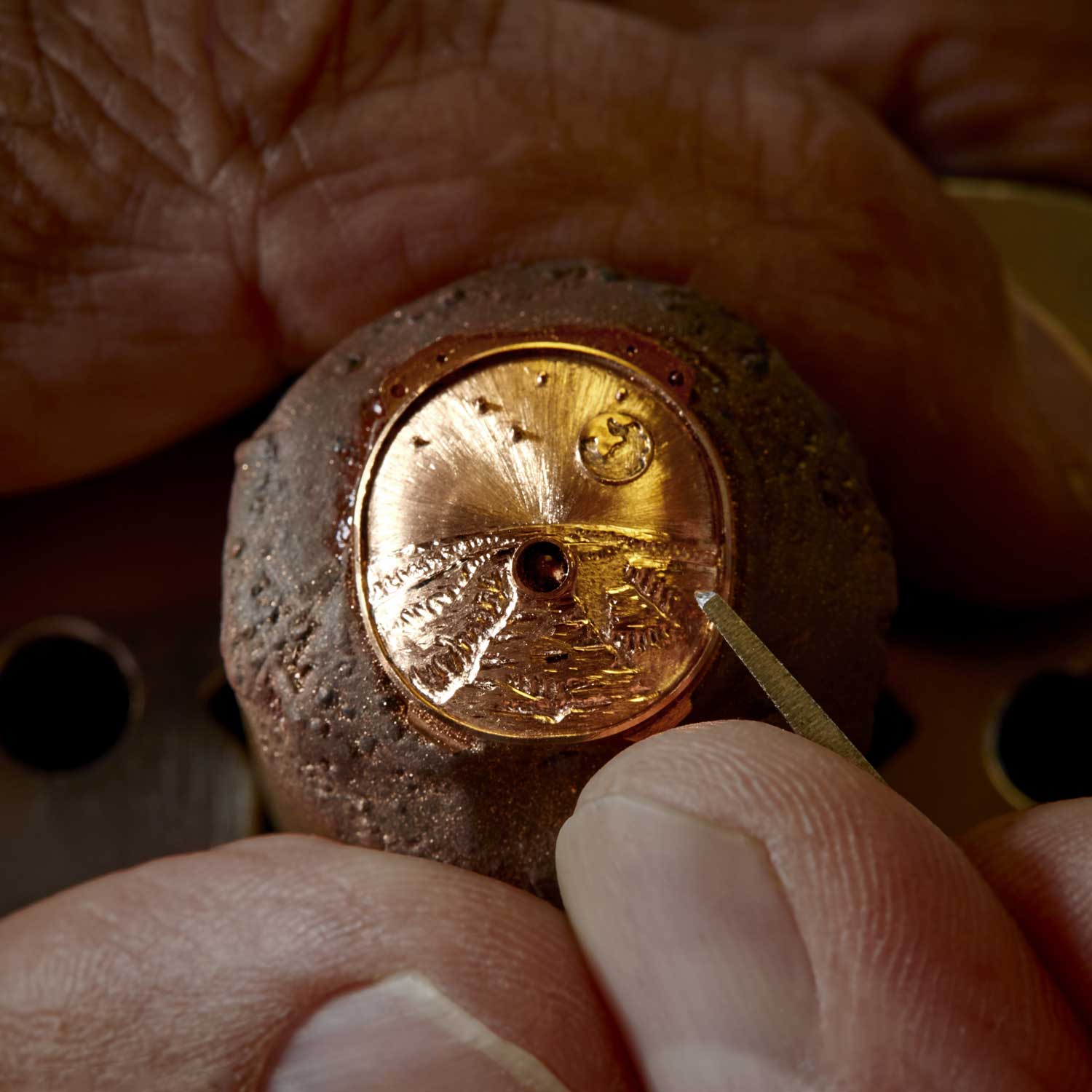 Hand engraving the 5N gold visor (Image: Jerome Bryon)